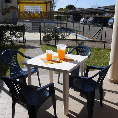Colourful Flat With A Fenced Garden And Fireplace