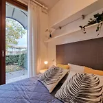 Apartment Colourful Flat With A Fenced Garden And Fireplace Bibione