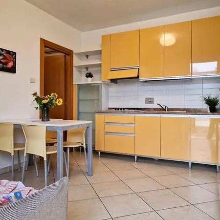 Colourful Flat With A Fenced Garden And Fireplace
