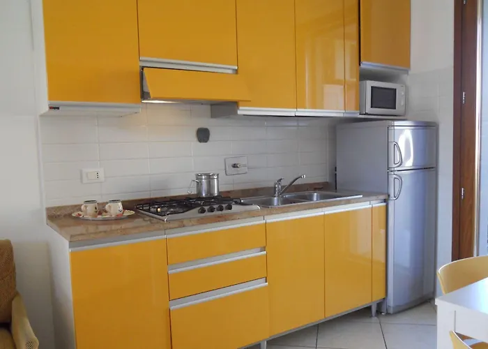 Appartamento Colourful Flat With A Fenced Garden And Fireplace Bibione